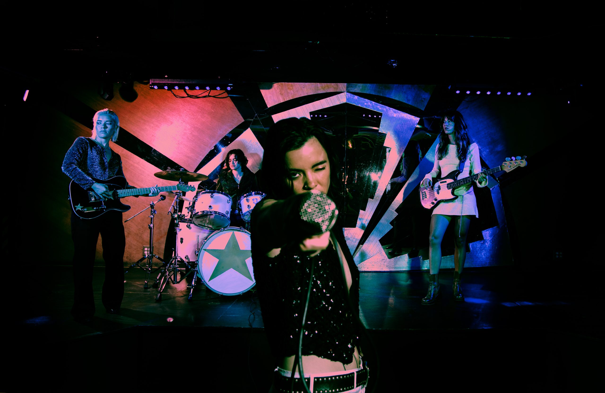 The Aces band live performance disco pop stage Dana Trippe photo