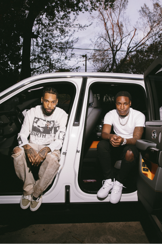 Mudbaby Ru and Key Glock sitting in SUV promoting Out The Mud single 2026