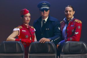 Monsieur Periné Carlos Vives El Avión music video airplane scene 2026