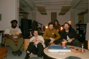 Passion Pit band photo 2026 Michael Angelakos and touring band