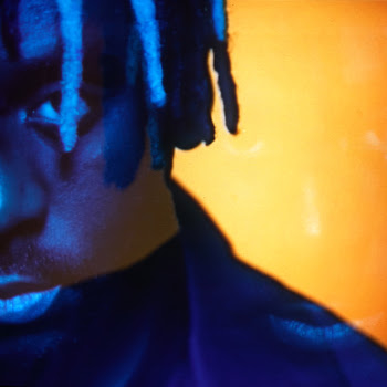 Myles Smith close up portrait blue and orange lighting album era visual