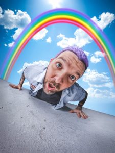 Dillon Francis portrait under rainbow sky promotional image 2026