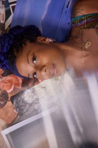 aja monet portrait blue headwrap close up photo Daniel N Johnson