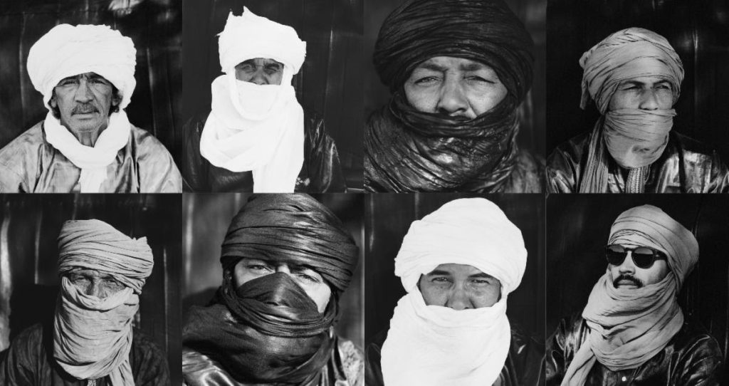 Tinariwen band members portrait black and white Tuareg musicians
