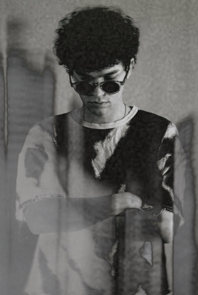 Hayden Summerall black and white portrait wearing sunglasses during Kaleidoscope era