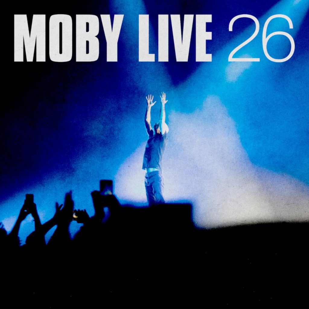 Moby LIVE 26 stage moment with crowd and blue lighting at Coachella