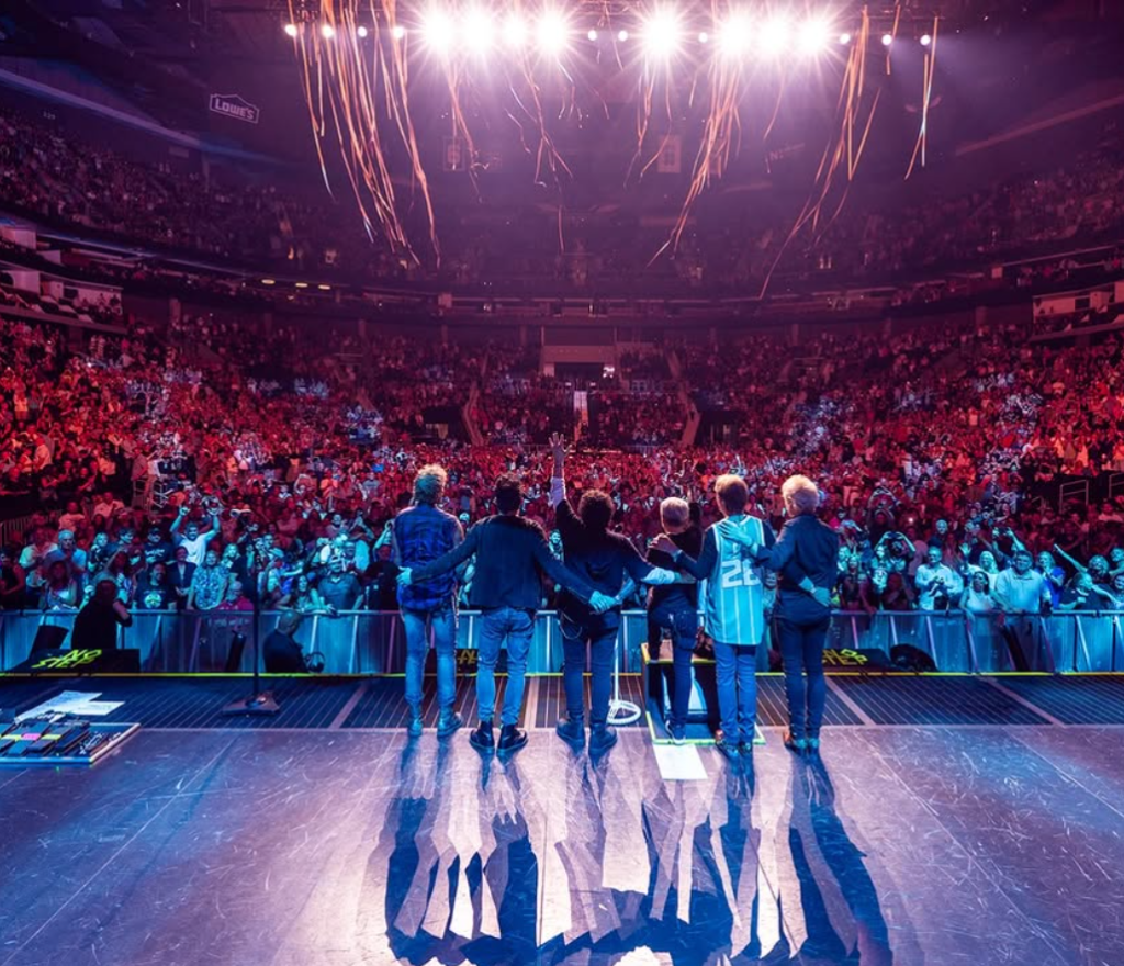 Journey takes a bow before a packed arena crowd during the Final Frontier Tour 2026