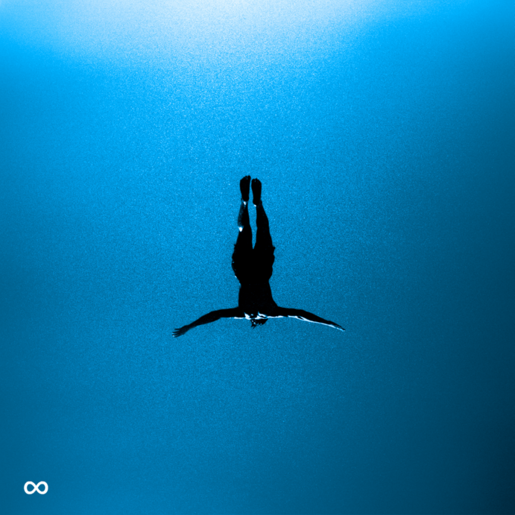 Silhouette of a person diving underwater against a deep blue background minimalist album artwork