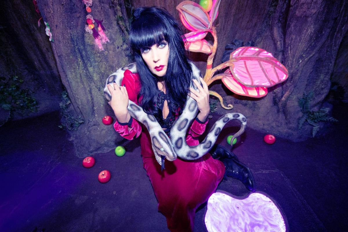 Brocarde portrait with snake in surreal forest setting promoting Seven Sins single