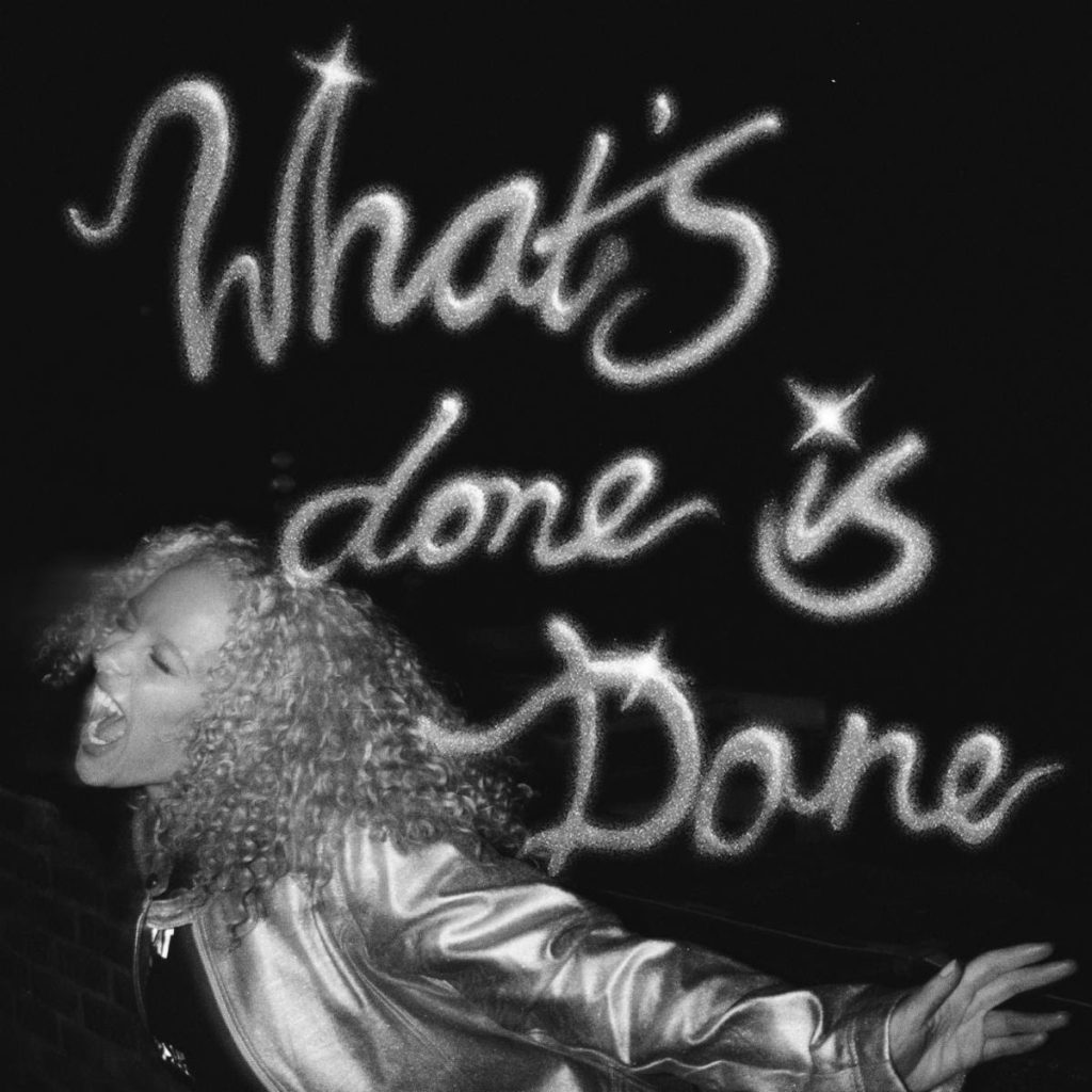 Jorja Smith poses in a striped top during a close-up promotional portrait ahead of the release of her single "What’s Done Is Done."