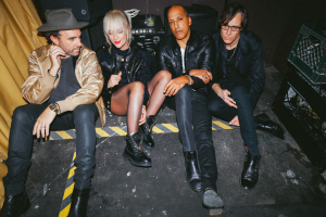 Metric band 2026 press photo Emily Haines indie rock group backstage