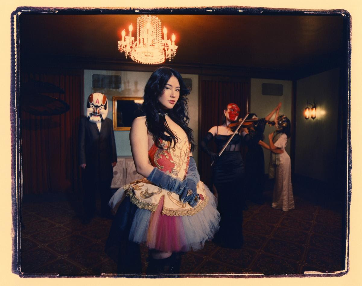 Emei Night at the Opera Promotional Portrait With Orchestra-Inspired Styling