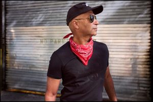 Tom Morello promotional portrait for his 2026 album Everyone Gets Everything They Want