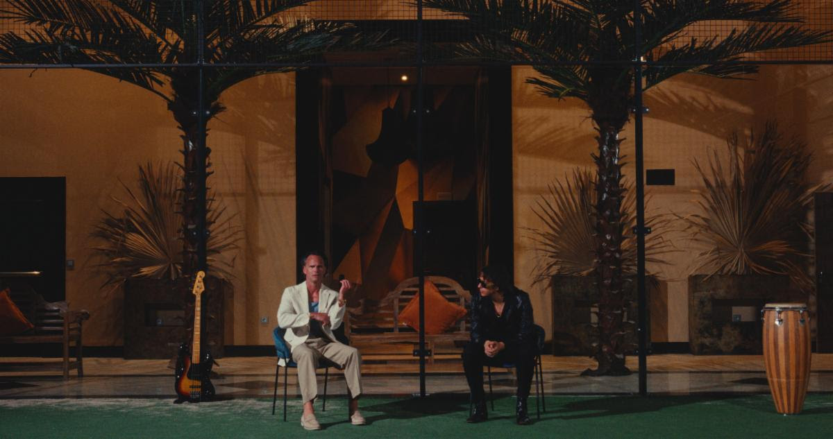 The Strokes and Walton Goggins in the "Going Shopping" music video