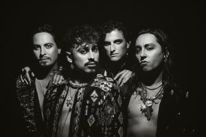 Greta Van Fleet pose for a black-and-white promotional portrait ahead of their intimate Chicago Metro performance and new single "Saw You Stand."