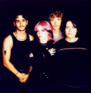 Los Angeles alternative rock band wilt pose for a promotional portrait ahead of the release of their 2026 single "bundy."
