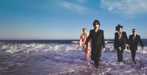 U2 members Bono, The Edge, Adam Clayton, and Larry Mullen Jr. in the official promotional image for their 2026 single "Street of Dreams."