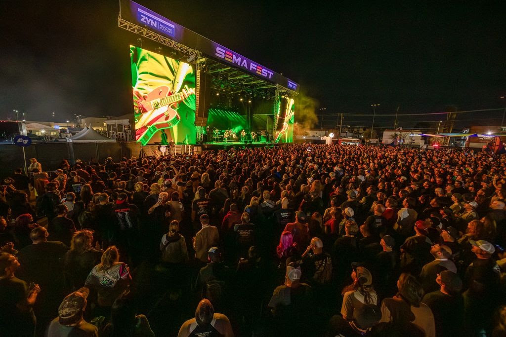 Fans watch a live performance during SEMA Fest at the Las Vegas Convention Center.