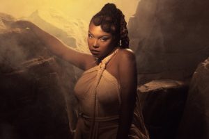 RYL0 surrounded by fiery phoenix wings for her 2026 single “Phoenix (Epilogue)”