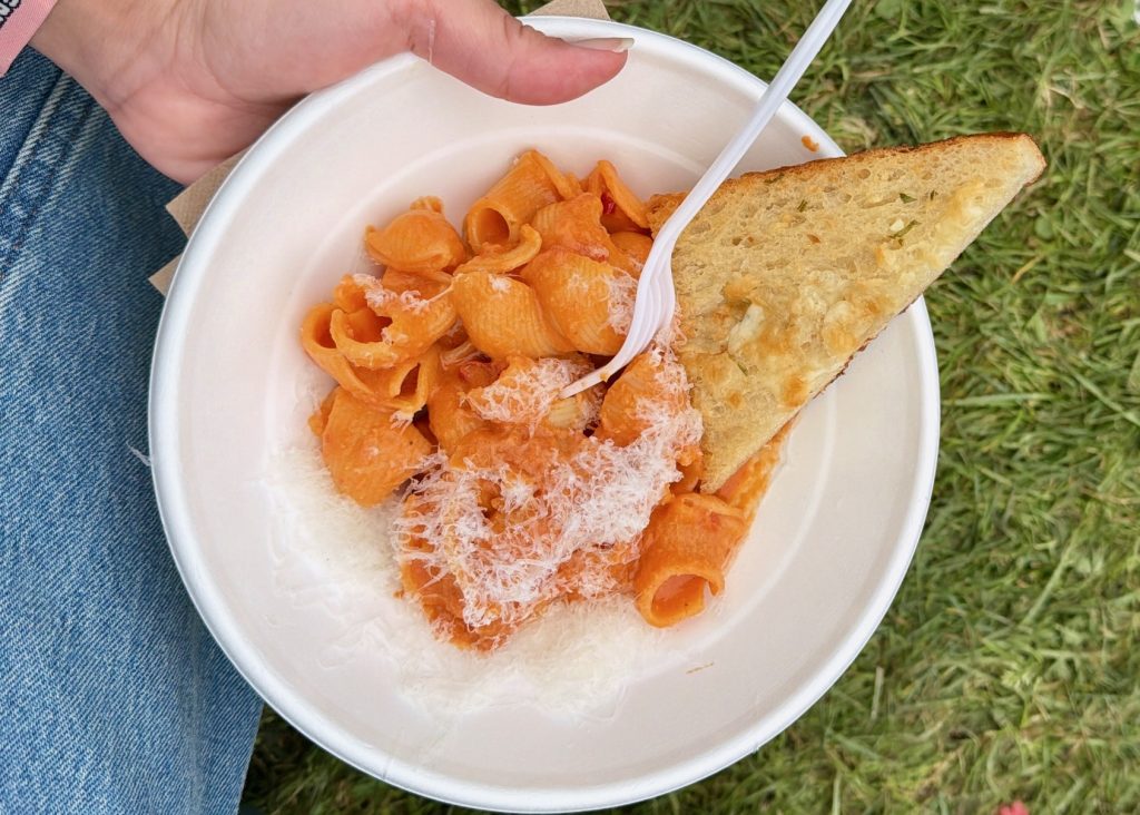 Original Joe’s spicy rigatoni with grated cheese and garlic bread at Outside Lands 2026 in San Francisco.