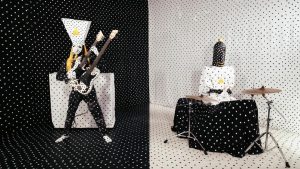 Angine de Poitrine perform with microtonal guitars and drums in their signature black-and-white polka-dot costumes