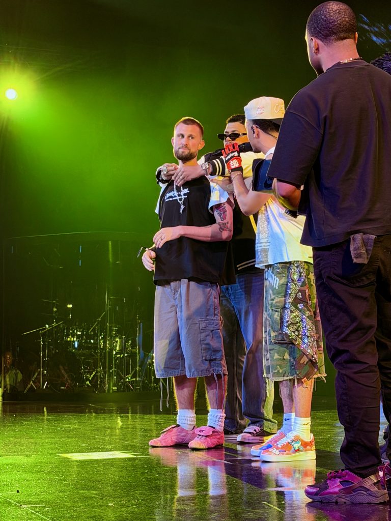 Miles Minnick recognizes a fan onstage during his GLO Fest headline performance in California.