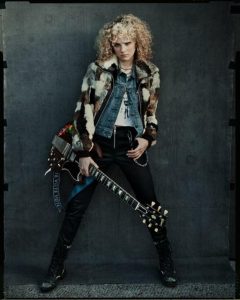 Grace Bowers poses with an electric guitar ahead of the release of her debut EP Grace.