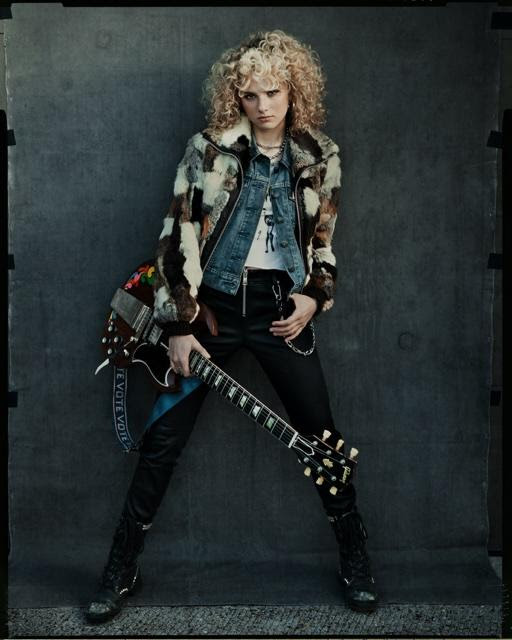 Grace Bowers poses with an electric guitar ahead of the release of her debut EP Grace.