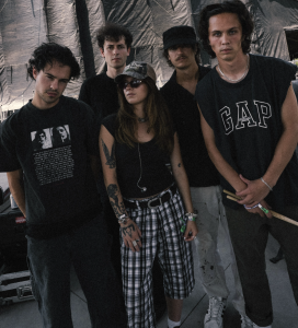 Minneapolis indie rock band Porch Light poses backstage ahead of their 2026 festival performances and headline tour.