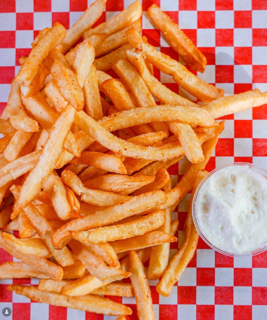 Shawarmaji seasoned french fries served with creamy garlic toum at Outside Lands 2026.