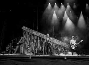 Queens of the Stone Age performing live during their 2026 tour supporting the release of "Easy Street" featuring Nikki Lane.