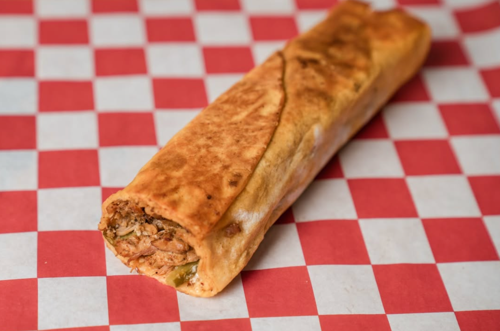 Shawarmaji chicken shawarma wrapped in toasted Jordanian flatbread, served at Outside Lands 2026.