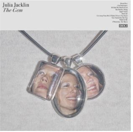 Album artwork for Julia Jacklin’s The Gem, featuring three portrait pendants suspended from a necklace.