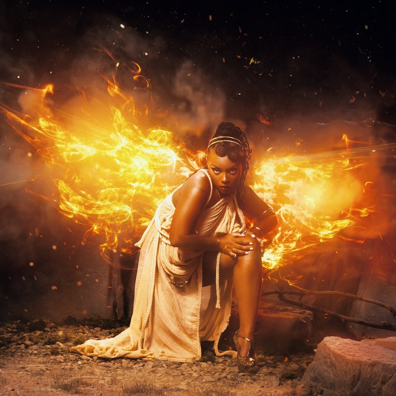 RYL0 surrounded by fiery phoenix wings for her 2026 single “Phoenix (Epilogue)”