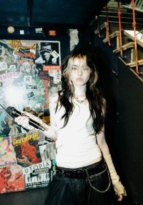 Ella Boh holding a microphone ahead of her 2026 BLURRY headline tour