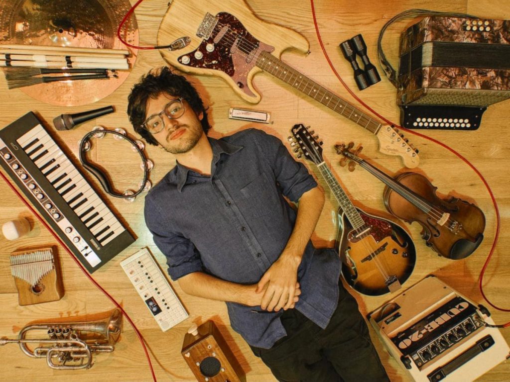 Ethan French surrounded by musical instruments for ideas of the day vol. 1