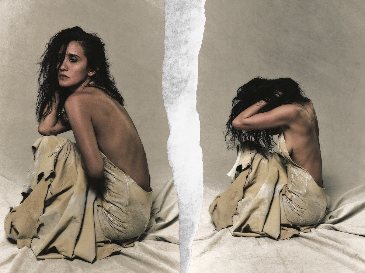 Jesse Jo Stark pictured in two intimate portraits separated by a torn-paper effect, wearing a draped beige dress against a neutral backdrop.